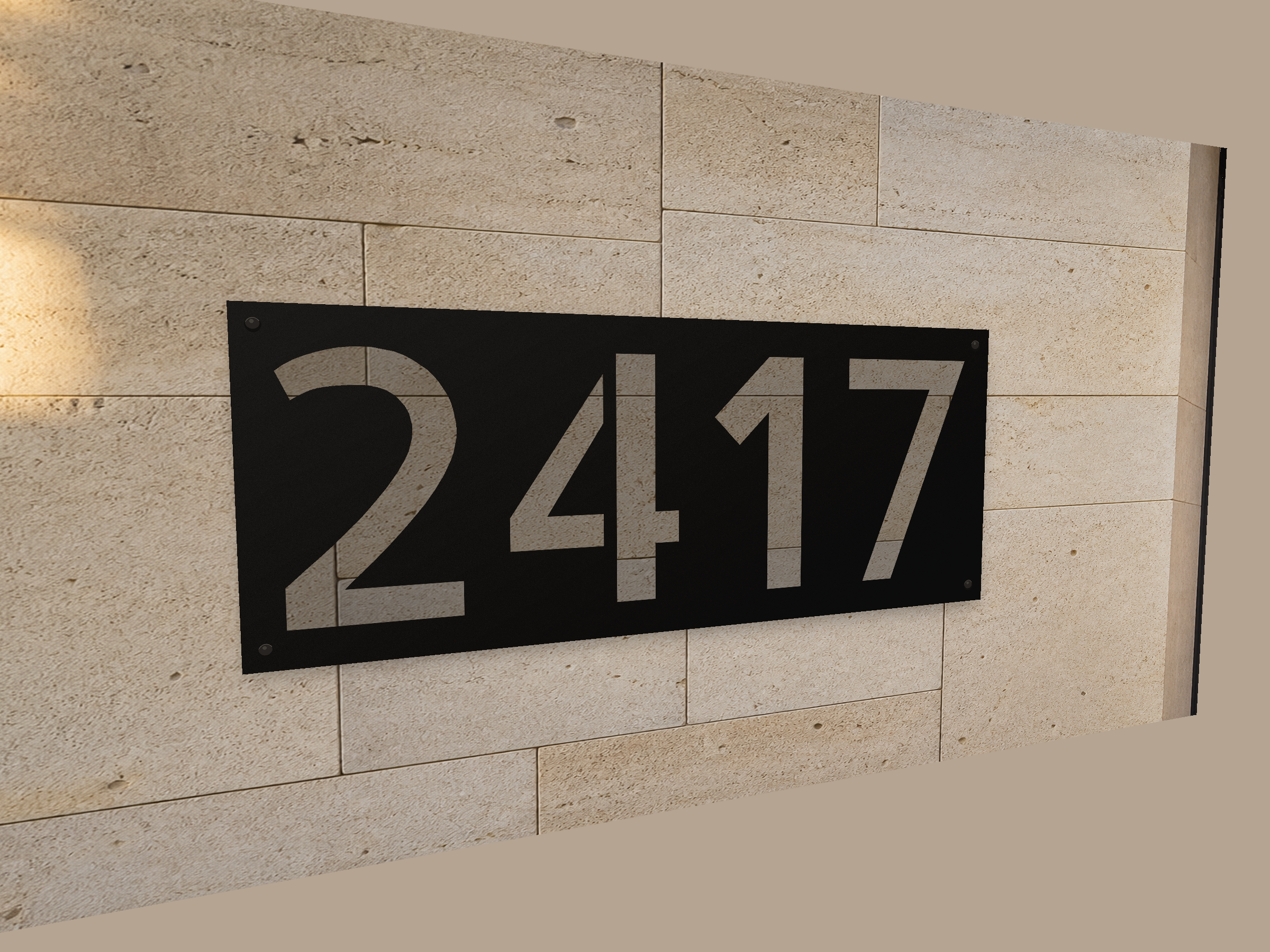 Black steel address block with stencil-cut numbers 2417, stone showing through the cutouts, mounted on limestone with hidden standoffs